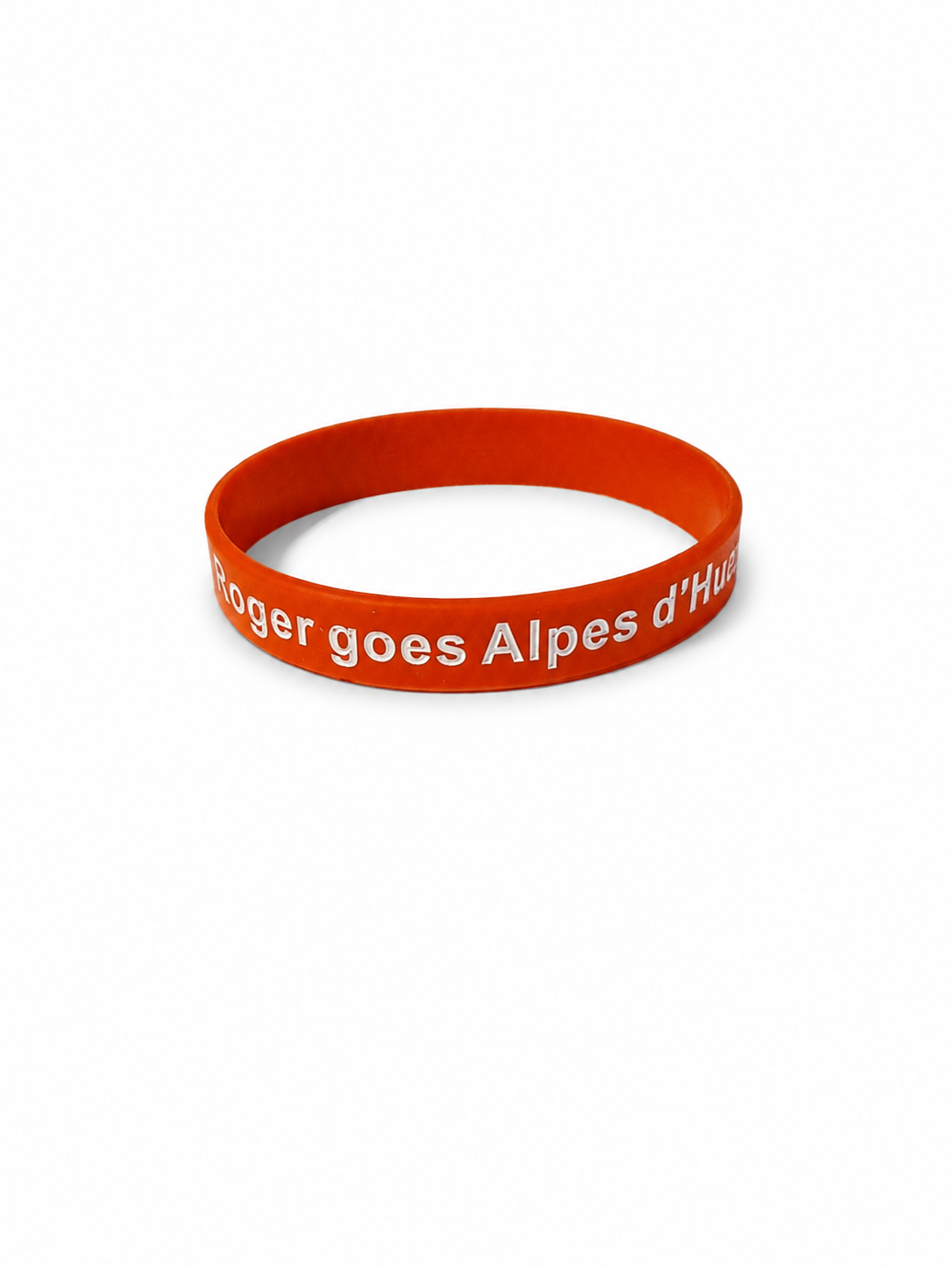 Armbandje met Roger-logo als steunproduct voor Rogers Alpe d'HuZes-campagne.